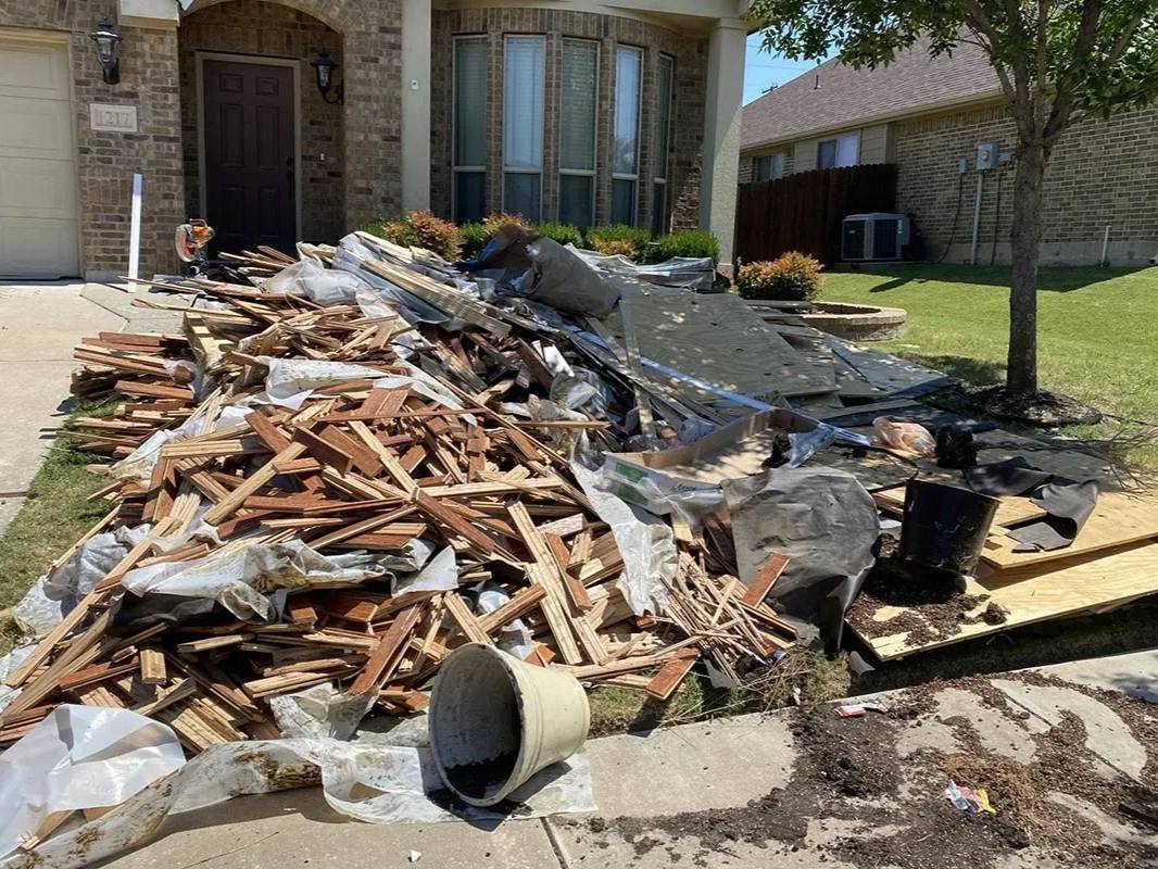 A pile of construction debris sits in front